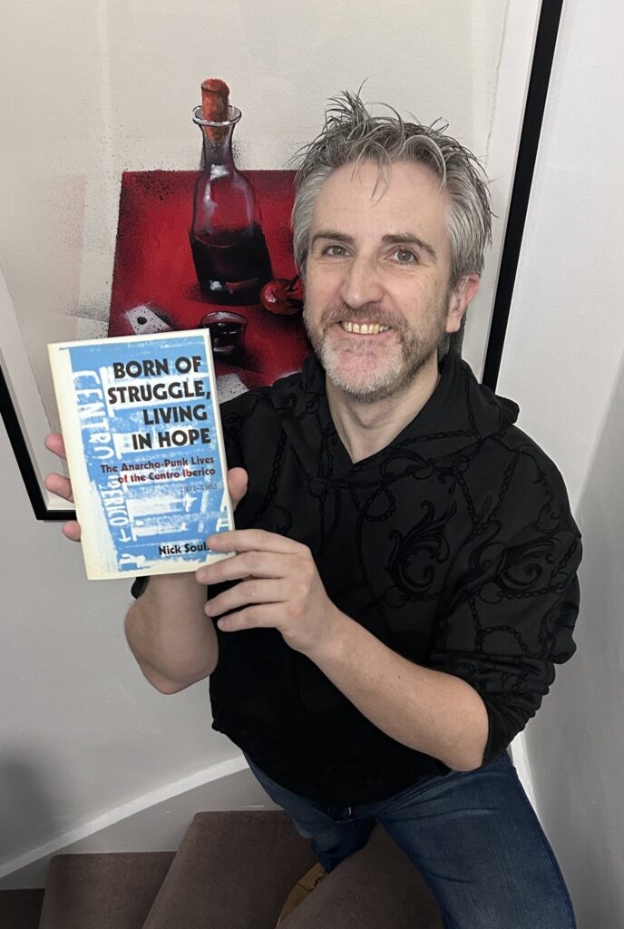 Nick Soulsby with Anarcho-punk Lives book