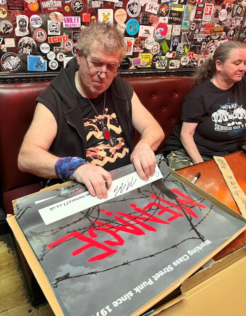 Noel Martin of Menace signing posters at the Dublin Castle Jun 2026 - photo by Ruth Rae